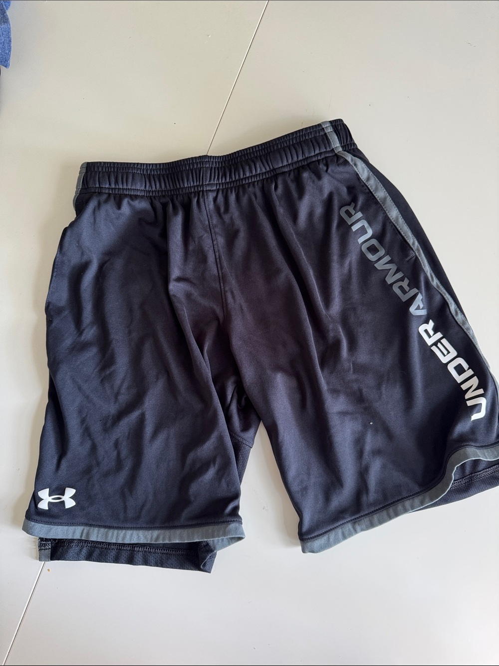 Under Armour Youth Large Black Athletic Shorts with Gray Trim
